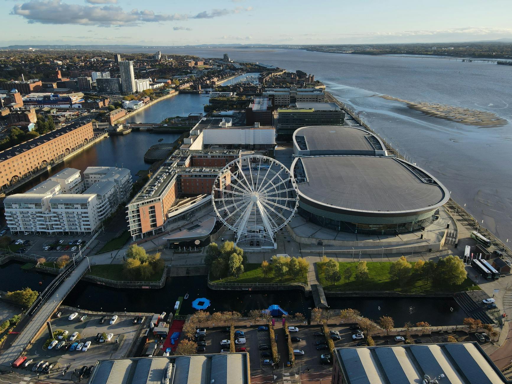 aerial view of buildings near body of water